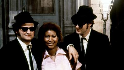 Aretha Franklin surrounded by actor John Belushi and Canadian actor and screenwriter Dan Aykroyd on the set of The Blues Brothers directed by John Landis.Corbis via Getty Images