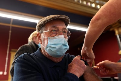 A man receives a dose of Covid-19 vaccine at a community vaccination centre at Hartlepool Town Hall. Reuters