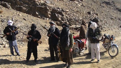 Taliban fighters on patrol in January 2010. AFP Photo