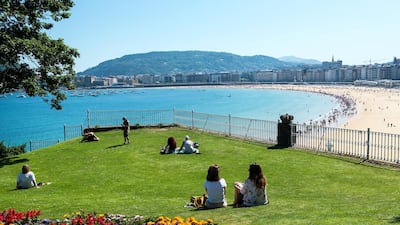 Locals and visitors enjoy a glorious summer day at the Miramar Palace Gardens, open to the public. Soak in the views of the beaches and all the way to both hills on either side of the city.