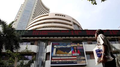 A screen displaying the Sensex on the Bombay Stock Exchange in Mumbai. Rajanish Kakade / AP Photo