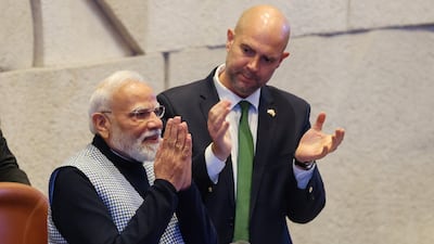 India's Prime Minister Narendra Modi stands with Knesset speaker Amir Ohana in the parliament chamber. Reuters
