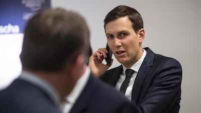 Jared Kushner, advisor and son-in-law of US President Donald Trump, speaks on his cellphone before a meeting between President Trump and the British Prime Minister Theresa May in January 2018. Special counsel Robert Mueller is probing Mr Kushner's efforts to get foreign investors beyond Russia to provide financing for his company during the presidential transition, including in China. Nicholas Kamm / AFP