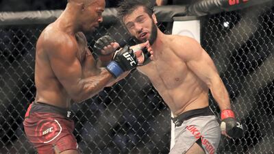 Abu Dhabi, United Arab Emirates - September 07, 2019: Featherweight bout between Lerone Murphy (red shorts, draw) and Zubaira Tukhugov in the Prelims at UFC 242. Saturday the 7th of September 2019. Yas Island, Abu Dhabi. Chris Whiteoak / The National