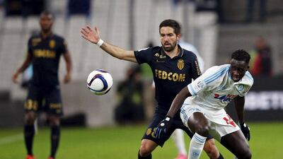 Marseille's Benjamin Mendy, right, in action against Monaco's Joao Iria Santos. REUTERS/Jean-Paul Pelissier