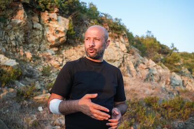 Raed Saleh, Minister of Disaster Management and Emergency Response, has remained on the ground with civil defence teams. Ahmad Fallaha for The National