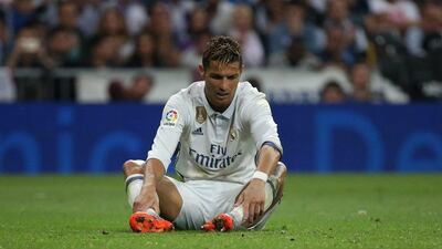 Real Madrid’s Cristiano Ronaldo looks dejected after Messi’s winning goal. Sergio Perez / Reuters