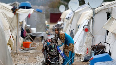 A mother and her baby in Nizip refugee camp, near the Syrian border in Gaziantep province, Turkey, on November 30, 2016. Reuters