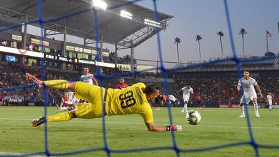 AC Milan goalkeeper Gianluigi Donnarumma stops a shot. AP Photo