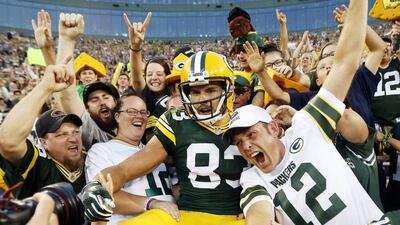 Green Bay Packers player Jeff Janis celebrates his touchdown with fans in an NFL pre-season game against the New Orleans Saints last week. Mike Roemer / AP / September 3, 2015