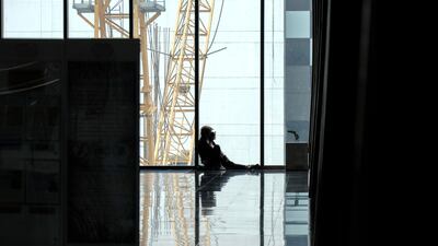 A woman uses her smartphone. Veejay Villafranca / Bloomberg