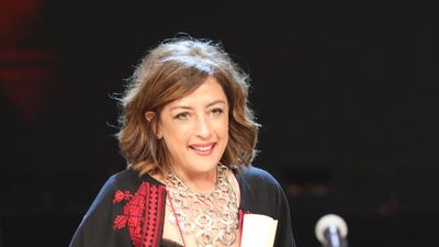 Palestinian director Najwa Najjar won Naguib Mahfouz Award for Best Screenplay during the closing ceremony of the 41st Cairo International Film Festival. EPA