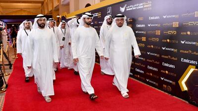 1 - Sheikh Mansour bin Mohammed bin Rashid Al Maktoum arrives at Madinat Jumeirah for the 2018/19 Arabian Gulf League Awards, together with UAE Football Association president Marwan bin Ghalita (L), and FA vice-president Abdullah Al Junaibi (R).