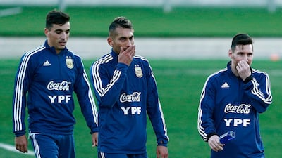 Argentina players Lionel Messi, right, midfielder Roberto Pereyra attend a training session at the Real Madrid's training facilities of Valdebebas. AFP