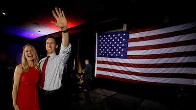 Missouri Senator-elect Josh Hawley with his wife Erin waves to supporters after giving his victory speech in Springfield, Missouri. AP Photo