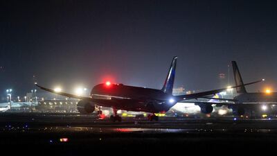 An A380 aircraft lands as the full moon shines at the international airport in Frankfurt, Germany. AP Photo