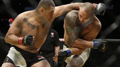 Cain Velasquez, left, fights Travis Browne during their heavyweight bout at UFC 200, Saturday, July 9, 2016, in Las Vegas. John Locher / AP Photo