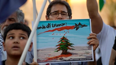Protesters at a rally in solidarity with the people of Gaza and Lebanon in the Bahraini capital Manama. AFP
