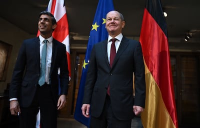 Climate experts say Rishi Sunak (L) and Olaf Scholz could lend political support to reform ideas. PA
