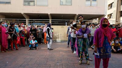 Bangladeshi citizens waiting to confirm their tickets back to Dhaka in the yard outside the embassy in Beirut Jenny Gustafsson