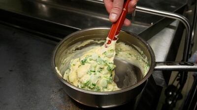 2. After cooking the spring onions for 2-3 minutes in butter, add the mashed potato and cream, stir together and heat through.