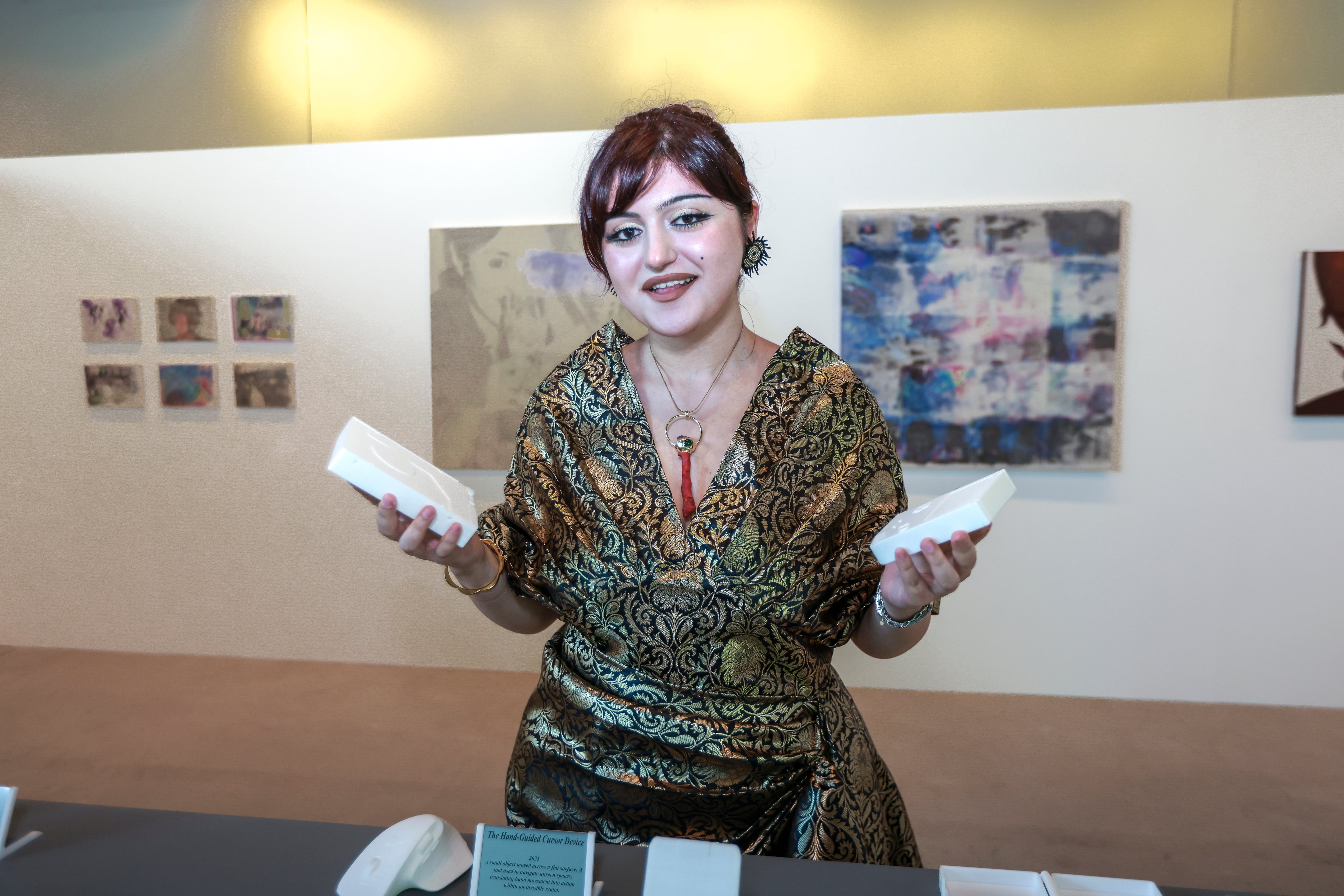 Sara Kamar explores how digital technology shapes memory and identity, questioning our growing reliance on devices to preserve personal experiences. Victor Besa / The National