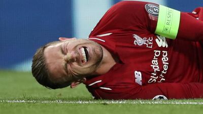 Jordan Henderson cries out in agony with a twisted knee, Reuters