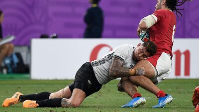 Wales' flanker Josh Navidi (R) is tackled by Fiji's centre Jale Vatubua during the Japan 2019 Rugby World Cup Pool D match between Wales and Fiji at the Oita Stadium in Oita. AFP