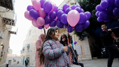 Palestinians in Bethlehem take part in the celebrations. Reuters