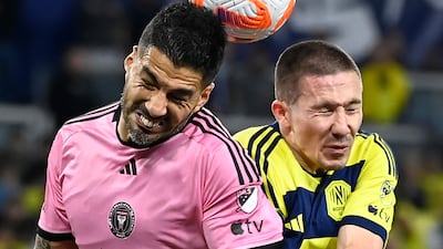 Inter Miami's Luis Suarez and Alex Muyl of Nashville challenge for a header. AP