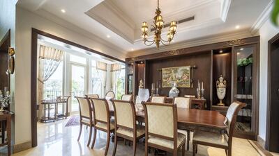 The dark wood finishings give it a country manor feel. Courtesy LuxuryProperty.com