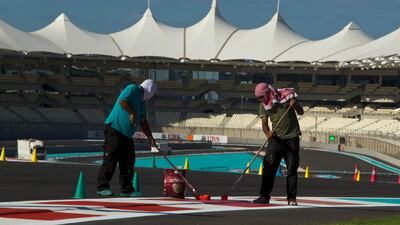 Crews prepare the track for the upcoming Formula 1 Etihad Airways Abu Dhabi Grand Prix at Yas Marina Circuit. Christopher Pike / The National