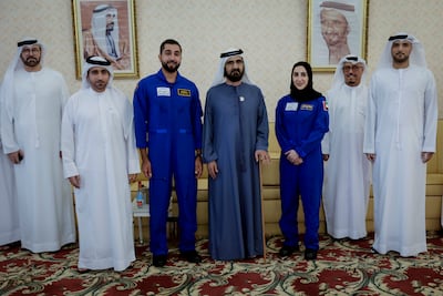 Sheikh Mohammed met Emirati astronauts Nora Al Matrooshi and Mohammed Al Mulla in Dubai on Monday. Photo: Wam