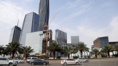 Cars drive past the King Abdullah Financial District, north of Riyadh. The development of the chemicals sector is a critical part of the kingdom's diversification strategy under Vision 2030. Reuters