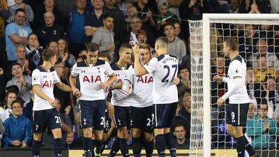 Tottenham’s Christian Eriksen celebrates scoring their second goal with teammates. Neil Hall / Reuters