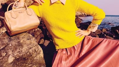 ELECTRIC BREEZE: Shirt, Dh1,150, Max Mara; Sweater, Dh2,290, J.W. Anderson; Skirt, Dh1,490, Max & Co; Scarf, Dh1,720, Hermes; Bag, Dh12,010, Prada