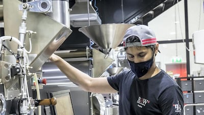 Coffee beans being roasted at the Raw Coffee Company. Antonie Robertson / The National