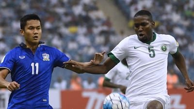 Thailand's Mong Kol, left, vies with Saudi Arabia's Omar Othman during their World Cup qualifying match on Thursday in Riyadh. Fayez Nureldine / AFP / September 1, 2016
