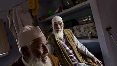 Mr Qadri will keep working on it until he dies. When that happens, his younger brother Mehzul Hasan, 70, pictured in the background, will bury him next to his wife and finish the job.