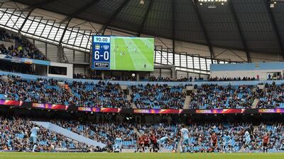 The scoreboard shows the 6-0 final result on Sunday at the Etihad Stadium, as Manchester City ensured Queens Park Rangers' relegation. Nigel Roddis / EPA