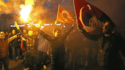 Supporters of candidate of main opposition Republican People's Party (CHP), for Istanbul mayor Ekrem Imamoglu cheer after the release of early results in the local election, in Istanbul. EPA