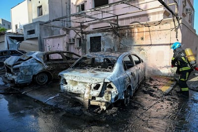 Iran's attacks on Bahrain wounded an 11-year-old girl, damaged homes and destroyed cars. Bahrain Interior Ministry/Reuters