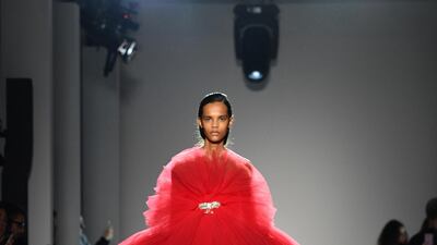 Giambattista Valli hedged his bets with dresses that were super short at the front but had a long train at the back. Getty Images