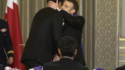 Mr Macron and Sheikh Tamim. EPA