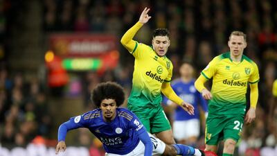 Leicester's Hamza Choudhury is fouled by Emiliano Buendia of Norwich. Reuters