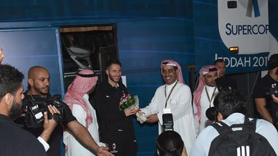 Andrea Bertolacci of AC Milan steps off the team bus. Getty Images