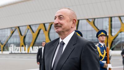 Mr Aliyev awaits Sheikh Mohamed's arrival at the airport in the Karabakh region