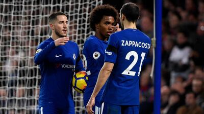 Eden Hazard, left, and Willian, centre, are expected to have key roles to play when Chelsea take on Barcelona on Wednesday. Will Oliver / EPA