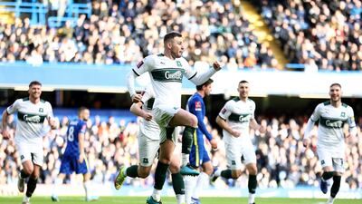 Macaulay Gillesphey of Plymouth celebrates after scoring against Chelsea. Getty