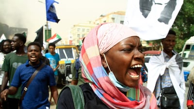 Protesters take part in a demonstration in the Sudanese capital Khartoum's twin city of Umdurman, on March 8. AFP